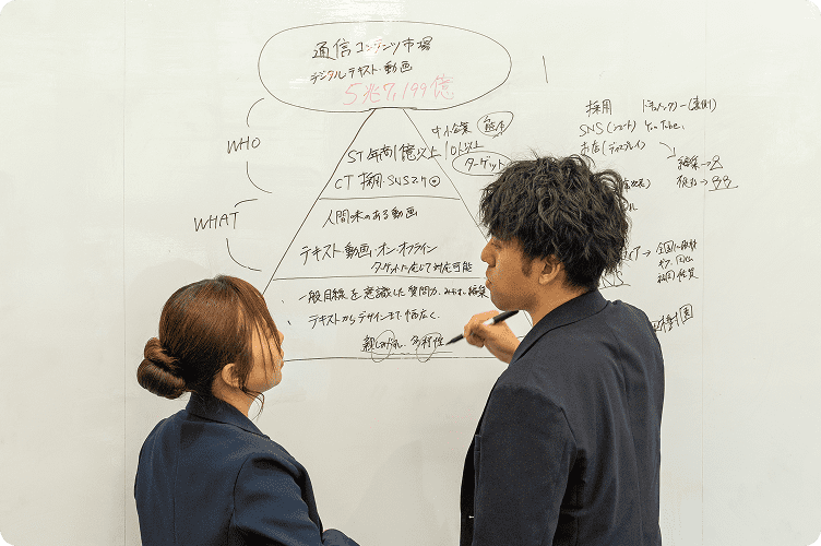 カメラを構える人物